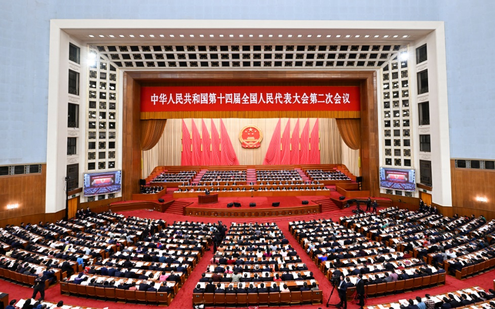 3月8日，十四屆全國人大二次會議在北京人民大會堂舉行第二次全體會議。 新華社記者 張領(lǐng) 攝