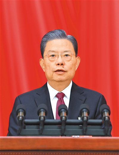3月8日，十四屆全國人大二次會議在北京人民大會堂舉行第二次全體會議。受全國人大常委會委托，趙樂際委員長向大會報告全國人大常委會工作。 　　新華社記者 王 曄攝